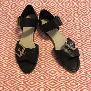ALDO. Awesome!  Leather, black open toe sandals.
